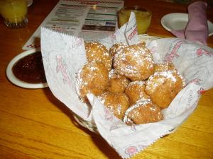 A bunch of food is in a basket on the table