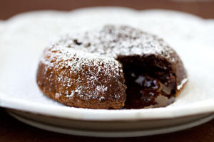 Chocolate lava cake with powdered sugar topping.