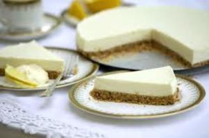 Slices of cheesecake on decorative plates.