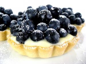 A close up of a blueberry pie