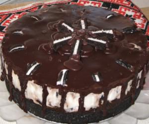 Chocolate cake topped with Oreo pieces.