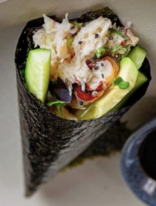 A close up of a wrap with food on it
