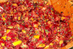 Cranberry salsa with herbs and diced fruit.