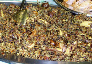 Wild rice and mushrooms in serving dish.