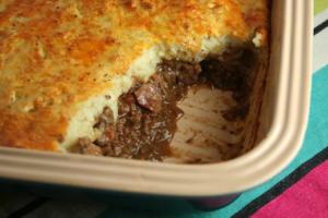 Shepherd's pie with a serving missing.
