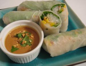 Spring rolls with peanut dipping sauce.