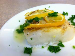 Seared cod fillet with lemon and parsley