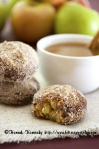 Cinnamon sugar donuts with apples and coffee.