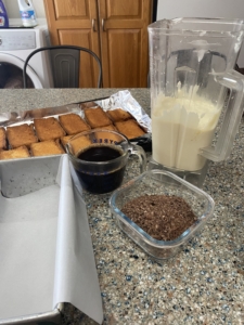 A counter with some food and milk on it