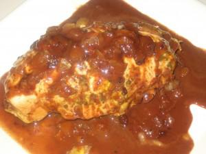 Stuffed chicken breast with rich brown sauce.