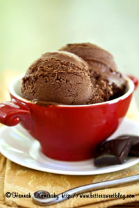 Chocolate ice cream in red bowl.