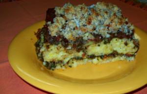Layered casserole on a yellow plate.
