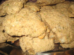 Homemade cookies stacked on a plate.