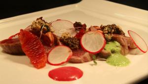 Seared tuna with radish and citrus garnishes