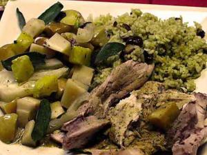 Roasted vegetables, seasoned meat, and herbed rice.
