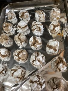 A bunch of cookies are on the pan