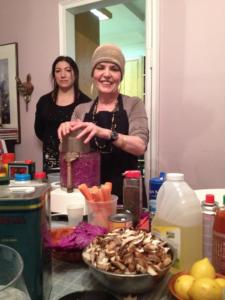 Woman preparing food in a kitchen.