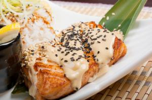 Seared salmon with creamy sesame sauce and rice