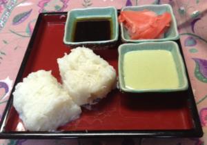 Rice with sauces and pickled ginger.