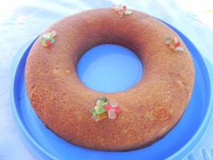 A donut with some little bugs on it