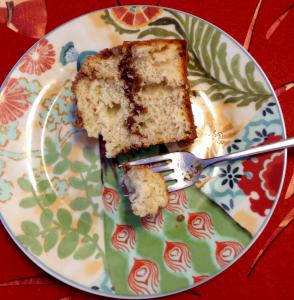 A plate with cake and fork on it