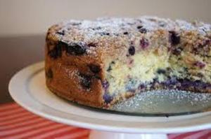 Blueberry cake with powdered sugar topping.