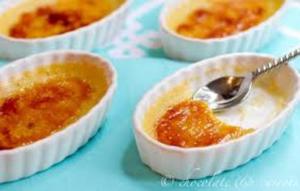 Creme brulee desserts in white ramekins.