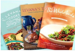 Three colorful cookbooks with food images.