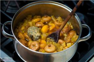 Pot of stewed fruits on stove.