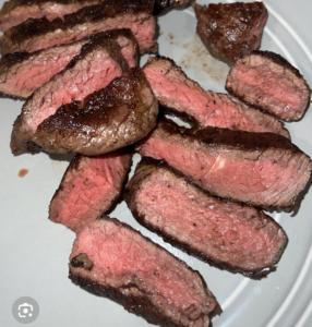 Medium rare sliced steak