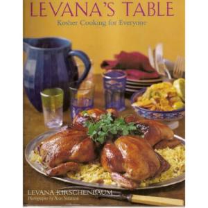 Kosher cuisine book with roasted chicken dish.
