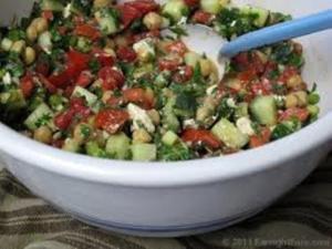 Chickpea salad with tomatoes and cucumbers.
