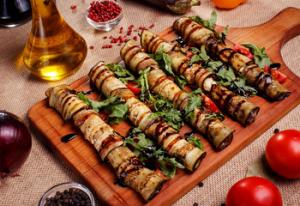Grilled eggplant rolls with herbs and balsamic