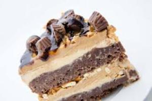 A piece of cake with peanut butter and chocolate.