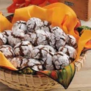 Basket of chocolate crinkle cookies with cloth.