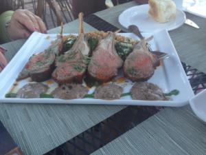 A plate of food on the table outside.