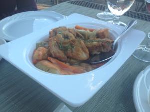 A white plate with some food on it