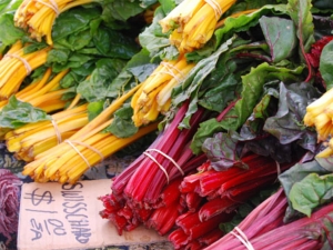 A bunch of vegetables are on the ground
