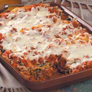 A casserole dish with some lasagna on it