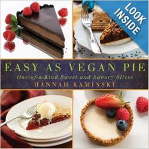 A book cover with four different pictures of cakes.