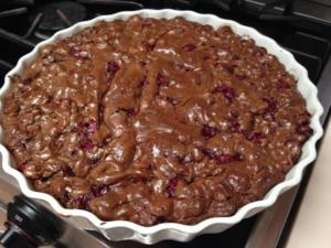 A close up of a pie with some type of crust