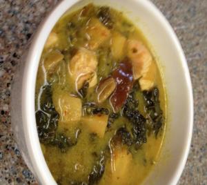Hearty bowl of potato, kale, and chicken soup