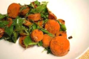 Sauteed carrot coins with fresh parsley