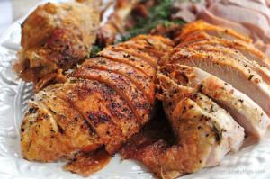 A close up of some meat on the grill