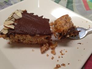 A piece of cake sitting on top of a white plate.