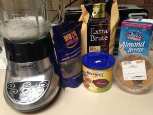 A counter with various food items and a coffee pot.