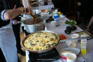 A pan of food on top of an electric stove.