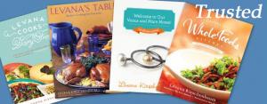 A close up of three books on food