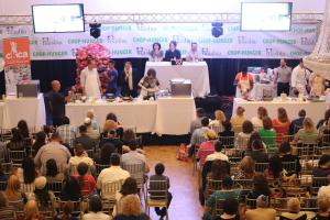 Audience watching chefs compete in cooking event