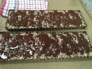 A close up of two chocolate bars on top of each other.